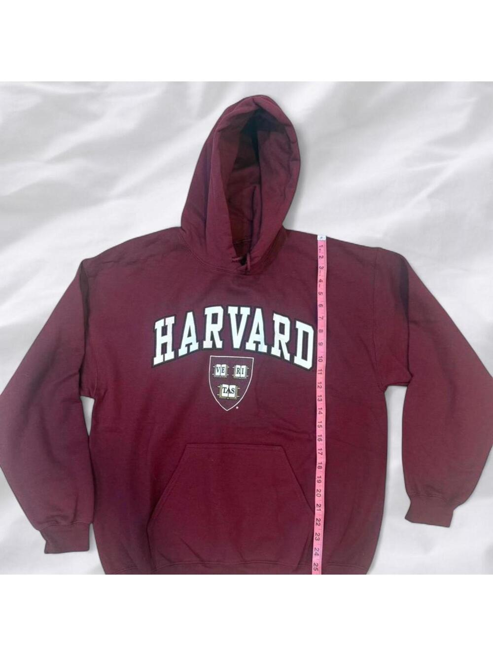 Burgundy Harvard hoodie with front pocket.